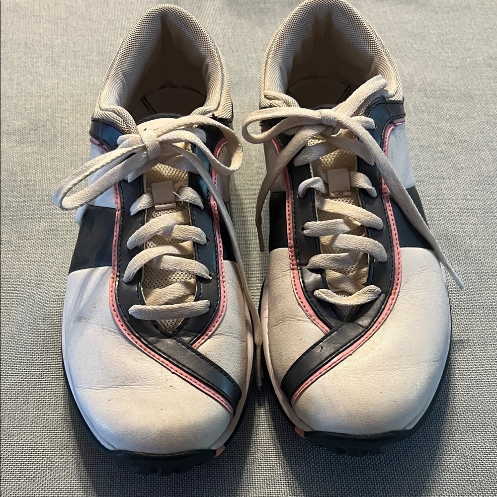 Nike White and Black Athletic Shoes with Pink Accents